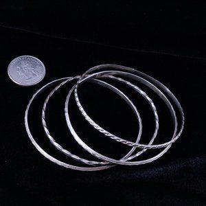 Four Sterling Silver Bangle Bracelets